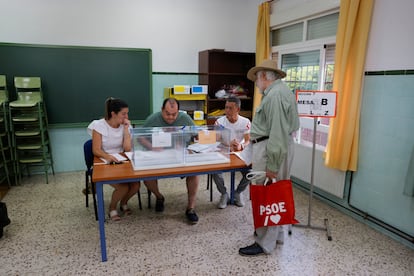 Members of electoral tables prepare for the opening of a polling station, during the general election in Ronda, Spain July 23, 2023.