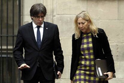 Carles Puigdemont y Neus Munté.