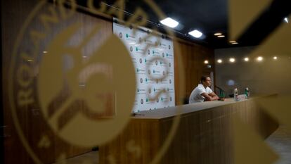 Spain's Rafael Nadal answers questions of journalist via a video connection in an empty press conference room after his first round match of the French Open tennis tournament at the Roland Garros stadium in Paris, France, Monday, Sept. 28, 2020. (AP Photo/Christophe Ena)