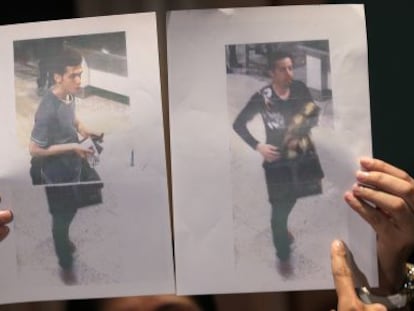 A polícia mostra as imagens de dois passageiros que voaram com passaporte roubado no voo desaparecido. À esquerda, o iraniano Pouria Nour Mohammad Mehrdad.