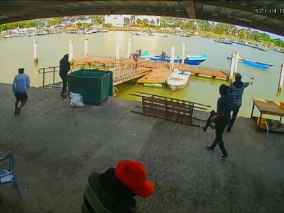 Captura de vídeo en el Puerto Pesquero Artesanal de Esmeraldas (Ecuador) que muestra a hombres armados disparando.