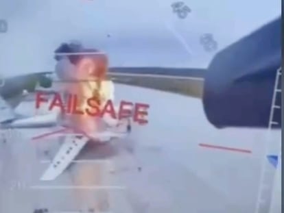 In this image taken from video released June 1, 2025, by a source in the Ukrainian Security Service shows a Ukrainian drone striking Russian planes deep in Russia's territory. (Source in the Ukrainian Security Service via AP)