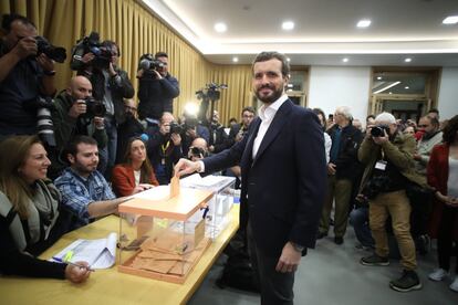Pablo Casado, the leader of the conservative Popular Party (PP), casts his vote in a polling station in Madrid.