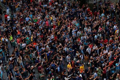 Around 6,000 people took part in a protest on Saturday to call for the resignation of the regional interior minister, Miquel Buch.