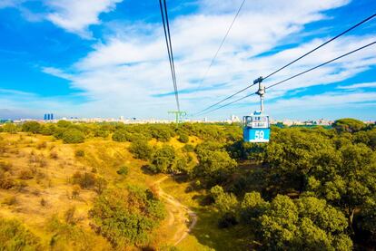 The Madrid Cable Car is the best place to get a bird’s eye view of Madrid's green spaces. The Madrid Cable Car, which has been around for almost 50 years, takes passengers on an 11-minute journey from the station at Pintor Rosales street to the one located within the Casa de Campo public park. Each cable car holds between five and six people, and bicycles and pets are also allowed on board.