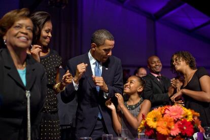 Michelle, Barack y Sasha Obama, en octubre de 2009 durante la Fiesta Latina organizada en la Casa Blanca.