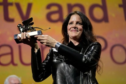 Laura Poitras poses with the Golden Lion at the Venice Film Festival, which she won last September for 'All the Beauty and the Bloodshed.'