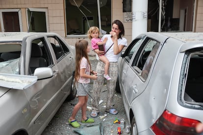 A woman cries with some girls after the attack on a children's hospital in Kiev this Monday.