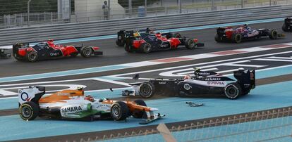 El piloto de Force India, Nico Hulkenberg, y el de Williams, Bruno Senna, se salen de la pista.