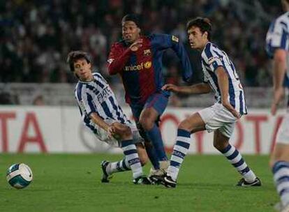 Los jugadores de la Real Sociedad celebran uno de sus goles.