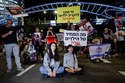 A group of protesters demand the release of hostages in Tel Aviv on Tuesday.