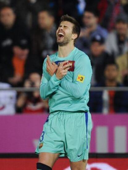 Piqué celebra su gol ante el Mallorca