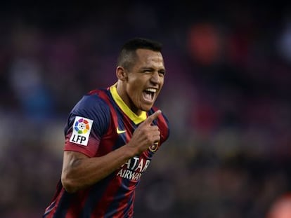 Barcelona&#039;s Alexis celebrates one of his three goals against Elche. 