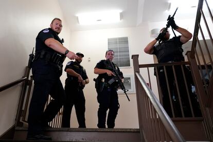 U.S. Capitol Police officers clear a stairwell in the Dirksen Senate Office Building next to the Russell Senate Office Building, Wednesday, Aug. 2, 2023, on Capitol Hill in Washington.