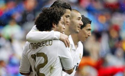 Marcelo, Cristiano, Benzema y Di María celebran un gol ante el Sevilla