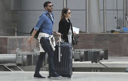 La actriz Paula Echevarría y el futbolista Miguel Torres en la estación de Málaga el pasado día 23.
