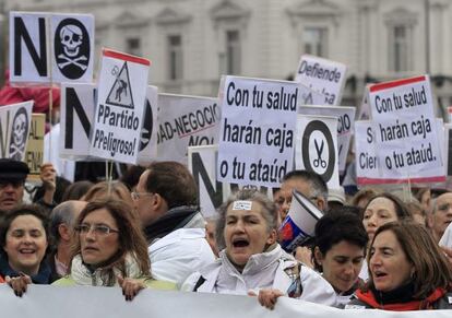 Health workers protest in Madrid Sunday.