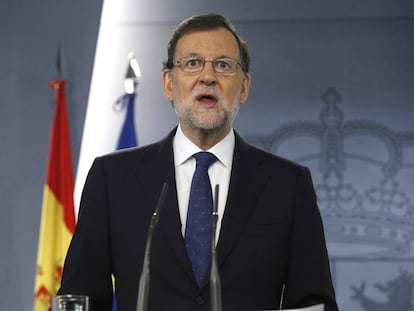 Acting PM Mariano Rajoy at a press conference on Friday.