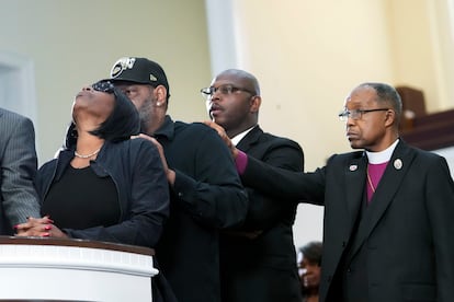 RowVaugn Wells, left, mother of Tyre Nichols, who died after being beaten by Memphis police officers, cries as she is comforted by Tyre's stepfather Rodney Wells, behind her, at a news conference with civil rights Attorney Ben Crump, in Memphis, Tenn., Monday, Jan. 23, 2023.