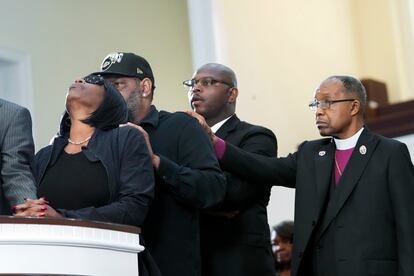 RowVaugn Wells, left, mother of Tyre Nichols, who died after being beaten by Memphis police officers, cries as she is comforted by Tyre's stepfather Rodney Wells, behind her, at a news conference with civil rights Attorney Ben Crump, in Memphis, Tenn., Monday, Jan. 23, 2023.