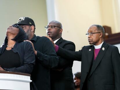 RowVaugn Wells, left, mother of Tyre Nichols, who died after being beaten by Memphis police officers, cries as she is comforted by Tyre's stepfather Rodney Wells, behind her, at a news conference with civil rights Attorney Ben Crump, in Memphis, Tenn., Monday, Jan. 23, 2023.