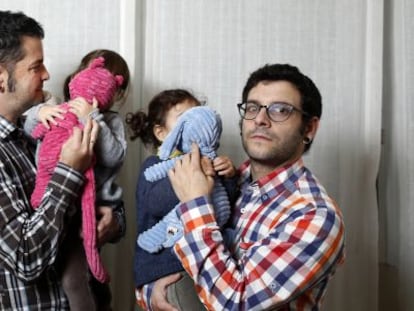 José Hernando and Javier Herraiz with their daughters, who were born via a surrogate in the US.