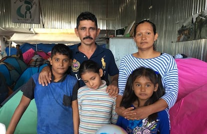 Rafael Castillo, Georgina Ayala and their children in a shelter in Tijuana.
