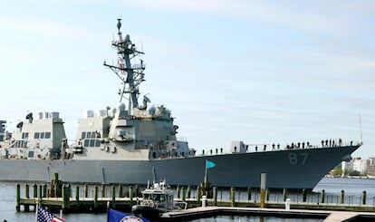 The USS Mason, an Arleigh Burke-class destroyer, passes a dock in Norfolk, Va., April 8, 2021.