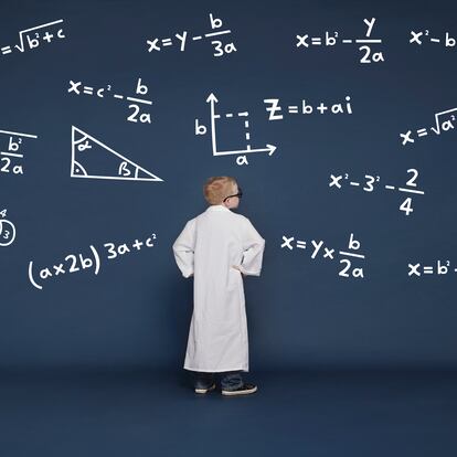 Boy with mathematical equations