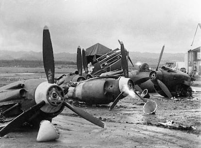 The shattered wreckage of American planes bombed by the Japanese in their attack on Pearl Harbor is strewn on Hickam Field, Dec. 7, 1941