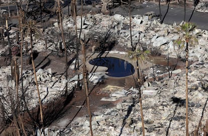  In an aerial view, a is surrounded by an apartment building that was destroyed by a wildfire on August 11, 2023 in Lahaina, Hawaii. Dozens of people were killed and thousands were displaced after a wind-driven wildfire devastated the town of Lahaina.