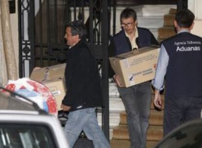 Investigators took away several boxes filled with evidence from Rato's home.