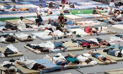 Refugiados en un pabell&oacute;n deportivo al sur de Alemania, el 11 de agosto.