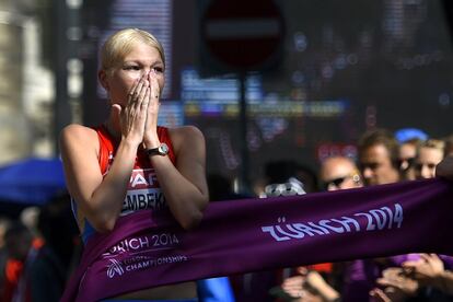 TOPSHOTS
Russia's Elmira Alembekova reacts after crossing the finish line to win in the women's 20km walk during the European Athletics Championships in Zurich on August 14, 2014.  AFP PHOTO / FABRICE COFFRINI
