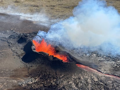 Lava spurts and flows after the eruption of a volcano in the Reykjanes Peninsula, Iceland, July 12, 2023