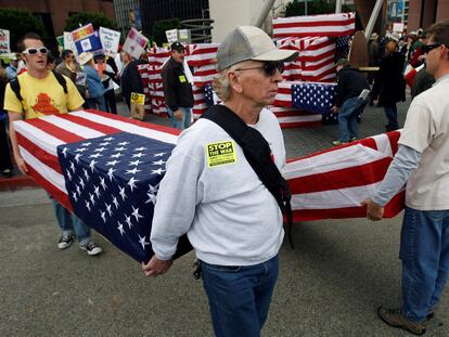 Protesters carry flag-draped mock coffins as they prepare to take part in an anti-Iraq War march in Los Angeles in January 2007.