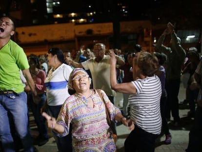 Opposition supporters celebrate the victory in Caracas.