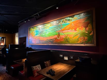 Hanging in the Jinja restaurant in Santa Fe are several paintings by Gene Hackman, who was a partner in the business.