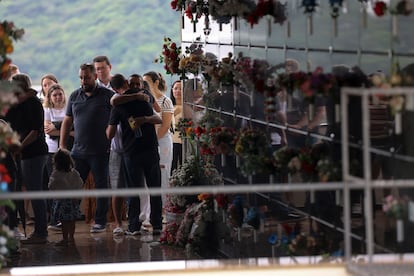 Relatives of one of the victims of an attack perpetrated by a man that burst into the Good Shepherd Center private preschool attend the funeral at the Sao Jose Cemetery, city of Blumenau, Santa Catarina State, in southern Brazil, on April 6, 2023