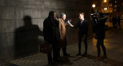 The victim’s lawyer, Carlos Bacaicoa (c) speaks to the press.