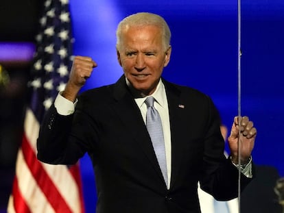 Then-President-elect Joe Biden gestures to supporters Nov. 7, 2020, in Wilmington, Del.
