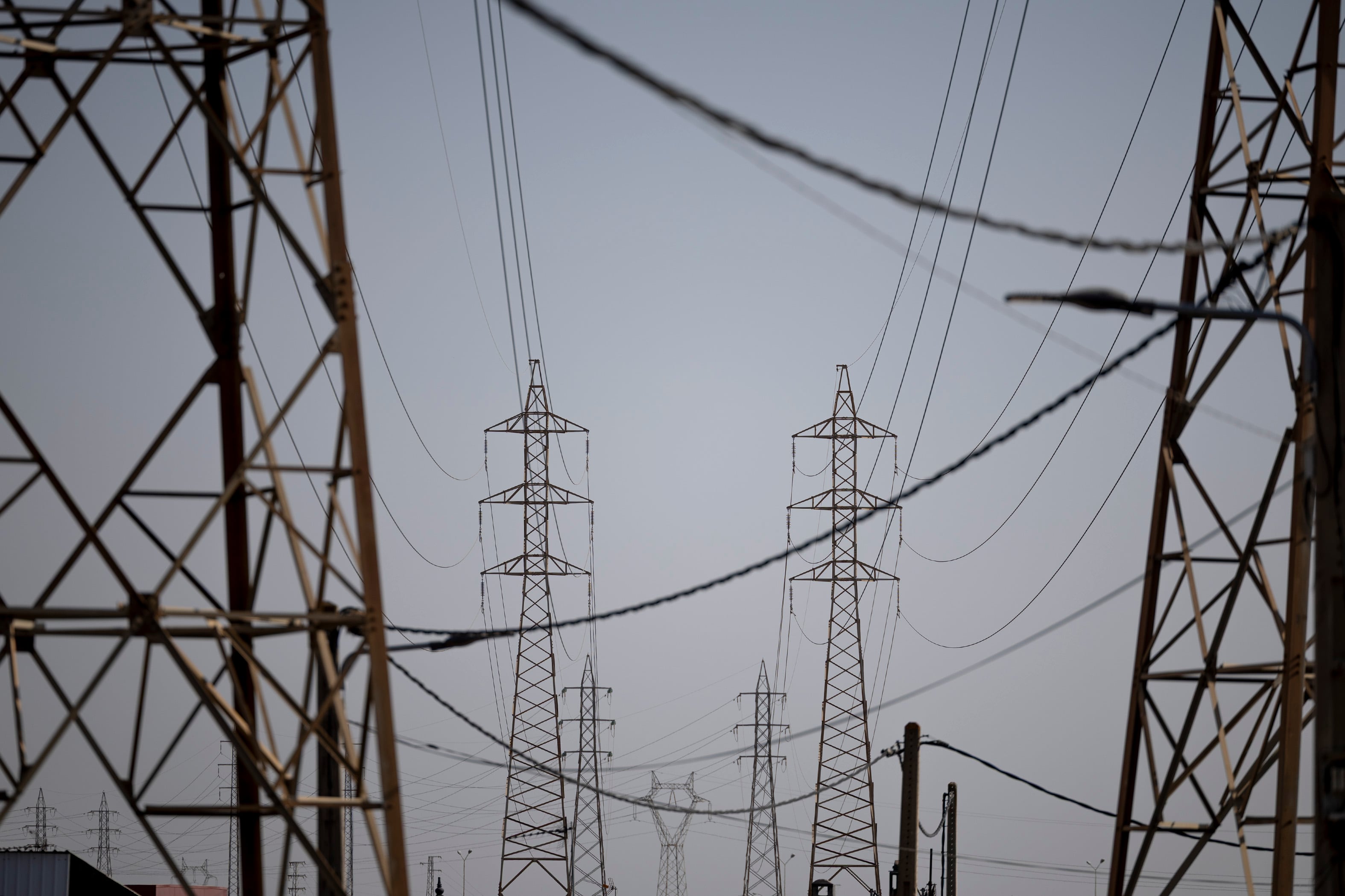 Cheaper German power, fees threaten