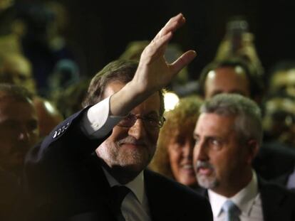 Mariano Rajoy greets supporters after being voted in the new prime minister of Spain.