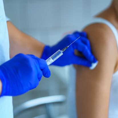 Vaccination a patient in hospital during an epidemic of influenza, measles. Flu shot, protection and prevention of viral infectious diseases