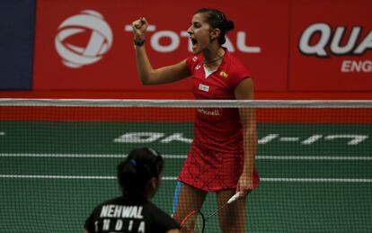 Carolina Marin celebra un punto de la final.