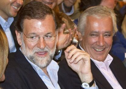 El líder del PP, Mariano Rajoy y el presidente del partido en Andalucía, Javier Arenas.