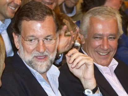 El líder del PP, Mariano Rajoy y el presidente del partido en Andalucía, Javier Arenas.