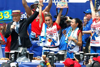 Competitive eater Miki Sudo (C) celebrates winning the 2023 Nathan's Famous Women's Fourth of July Hot Dog Eating contest in Coney island in Brooklyn, New York, USA, 04 July 2023.