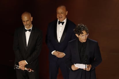 From left to right, James Wilson, Leonard Blavatnik and Jonathan Glazer collect the Oscar for best international film for 'The Zone of Interest,' at the Dolby Theater in Hollywood on March 10, 2024.
