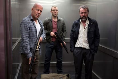 Yippee ki-yay: Father and son Bruce Willis (l) and Jai Courtney (c) team up in A Good Day to Die Hard.